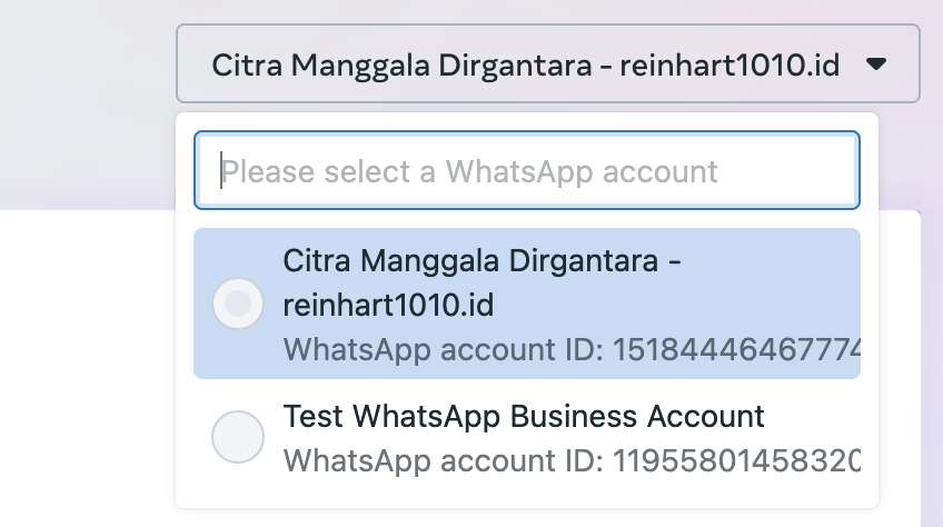 A snapshot of the upper right corner of the Meta WhatsApp Manager, with a selection of the active WhatsApp Business Accounts as well as respective Account IDs.